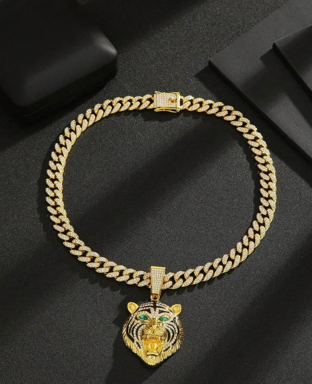 Iced out encrusted chain with tiger pendant