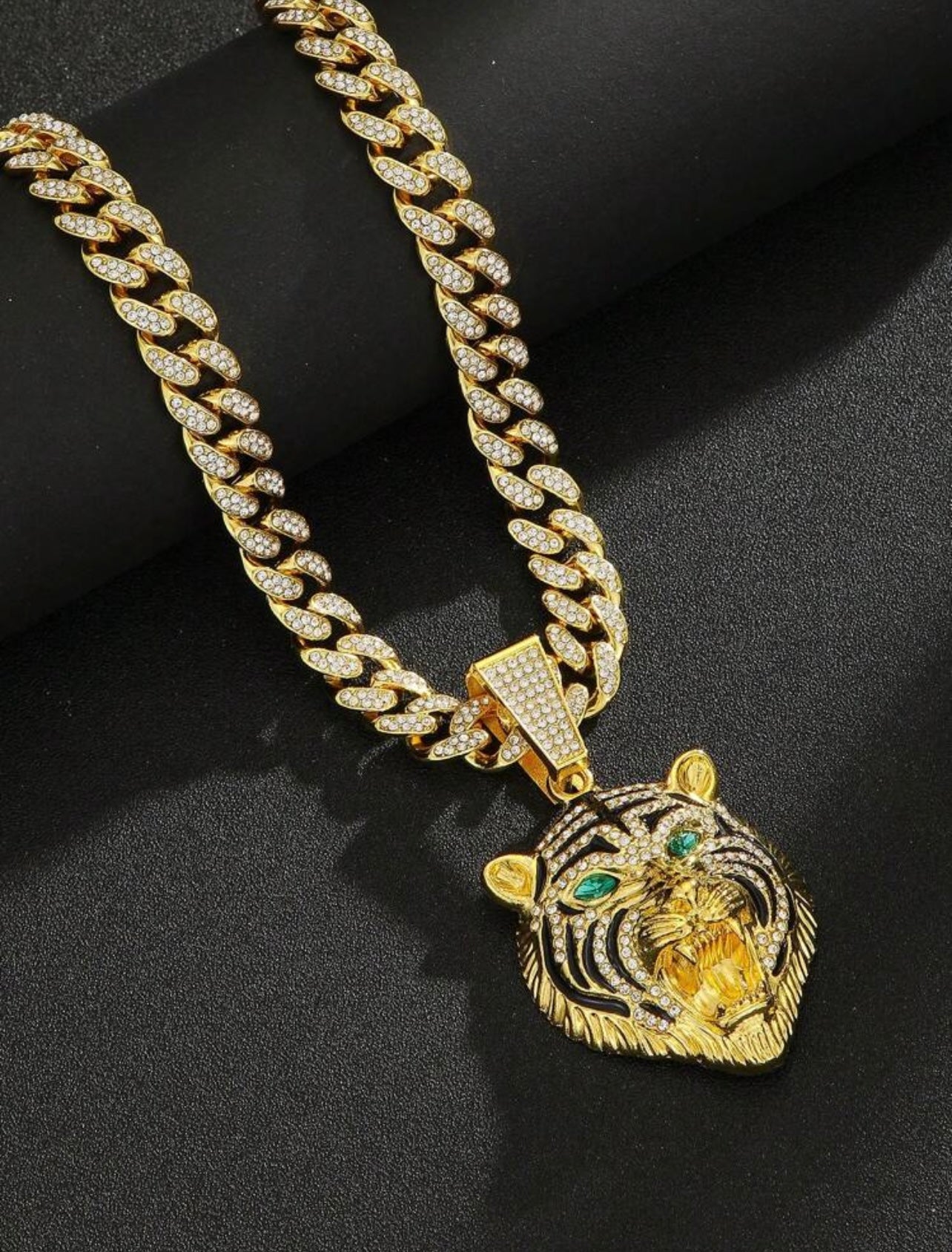 Iced out encrusted chain with tiger pendant